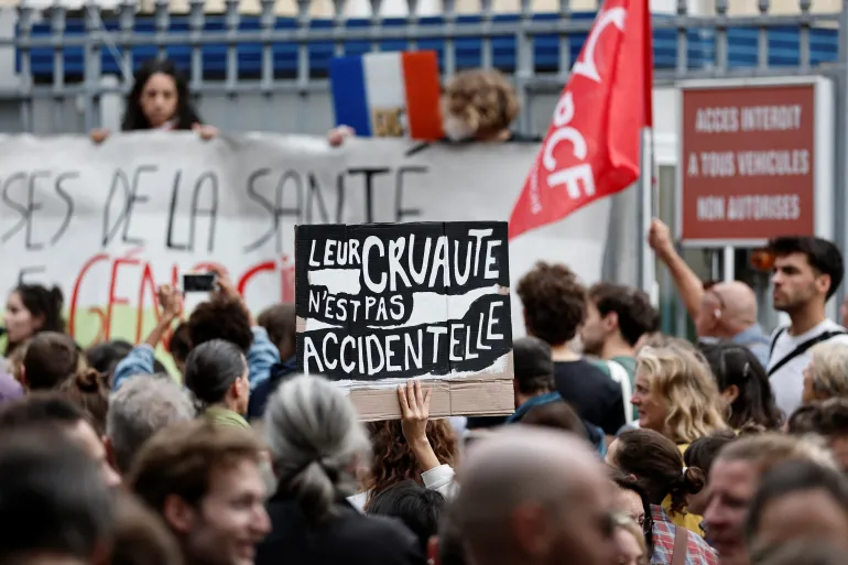 Mass Protests in France as Workers Strike Over Government Spending Cuts Mass Protests in France as Workers Strike Over Government Spending Cuts